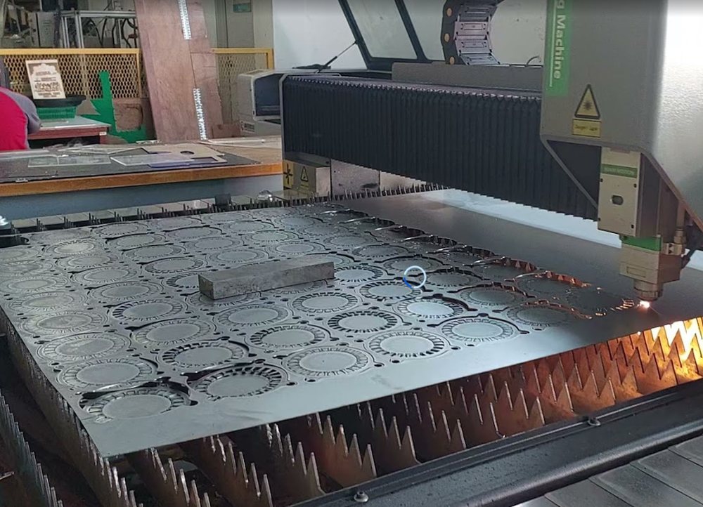 Stator laminations being laser cut from electrical steel sheet